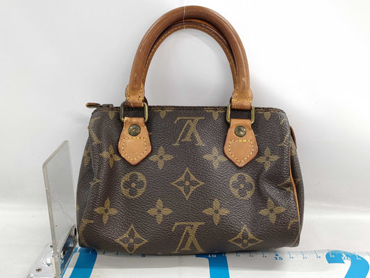 LOUIS VUITTON Monogram Mini Speedy Handbag with Strap