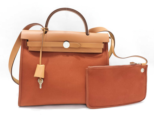 HERMES Airbag Zip Toile Officier Orange Canvas Handbag with A Stamp and Silver Hardware