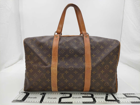 LOUIS VUITTON LOUIS VUITTON Monogram Sax Pool Boston Bag