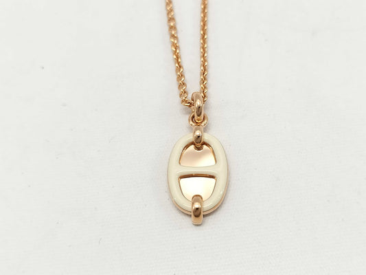 HERMES Mini Maillon pendant in cream with pink gold hardware. Necklace