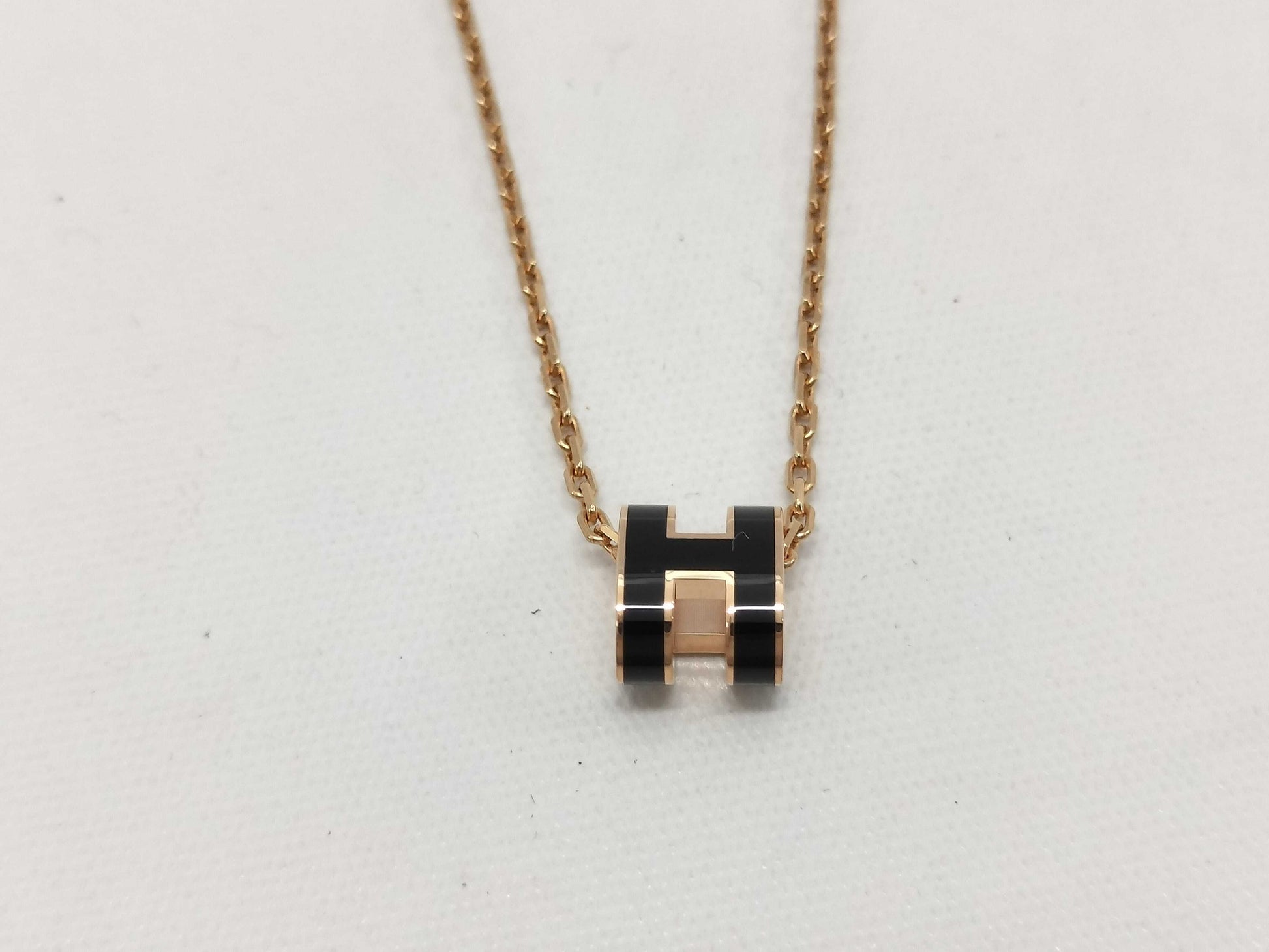 HERMES "Mini Pop H" Black and Pink Gold Hardware Necklace