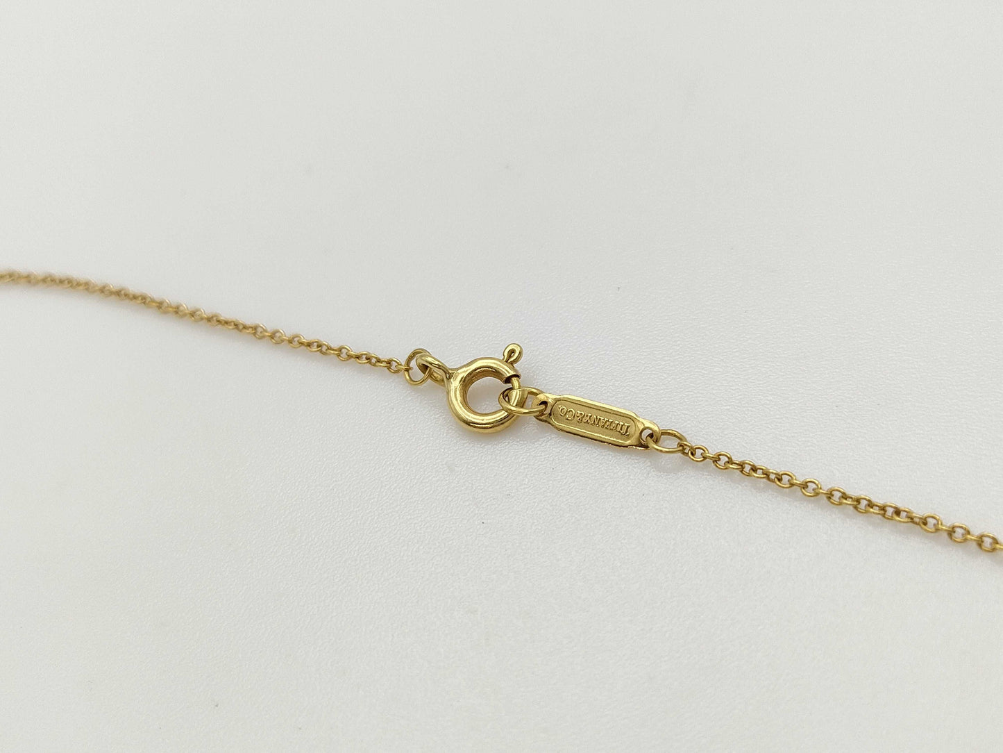 Tiffany & Co. Cross Stitch Signature Diamond Necklace in 750 Yellow Gold, 4.5g 