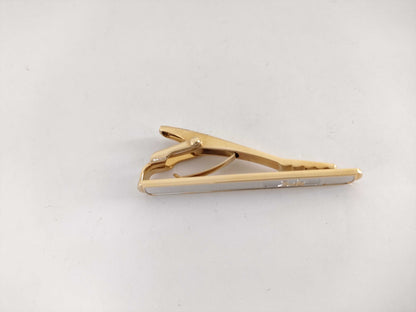CELINE brand tie pins and cufflinks