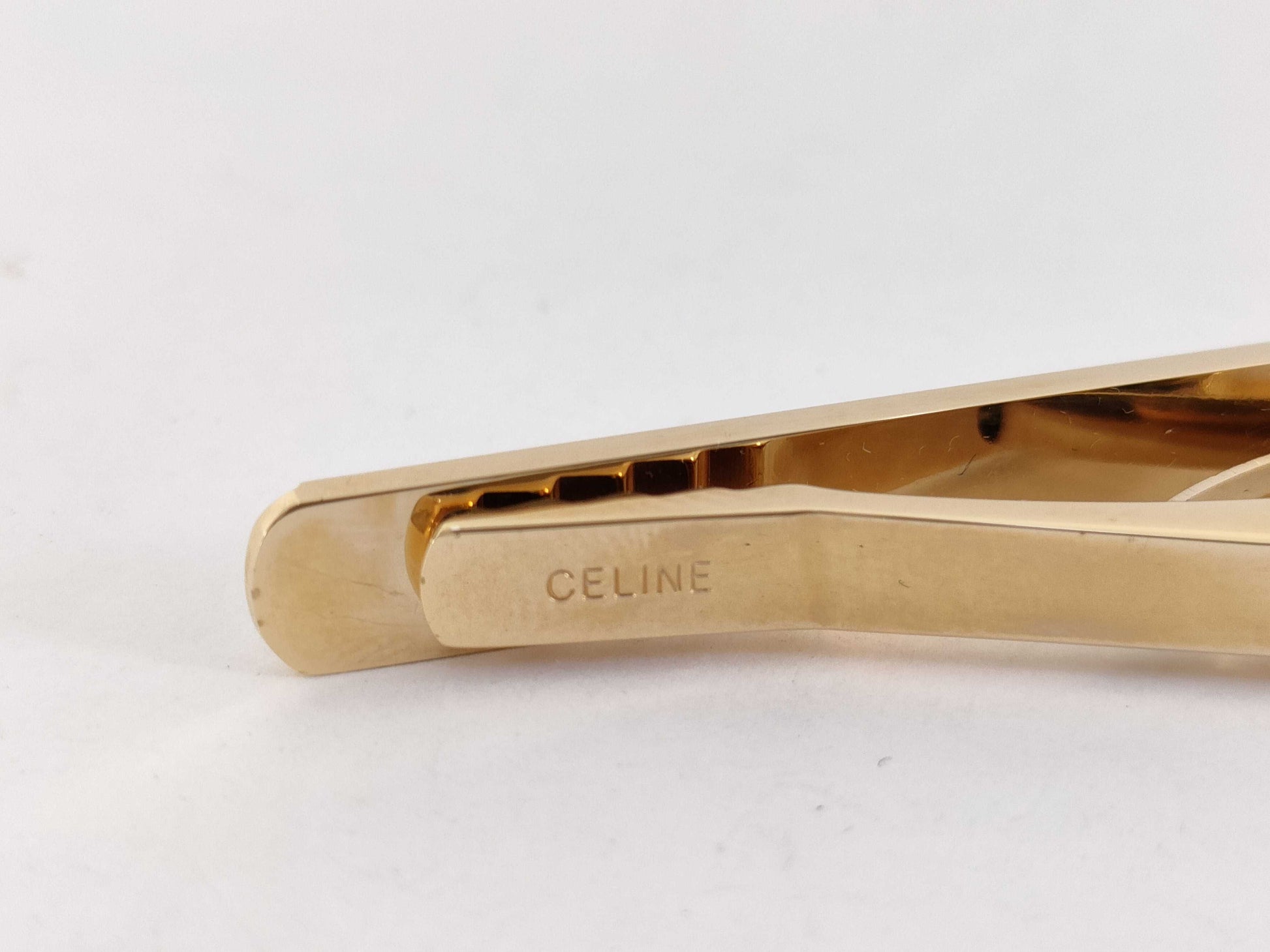 CELINE brand tie pins and cufflinks