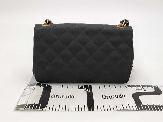 CHANEL Mini Matelasse Satin Chain Shoulder Bag in Black