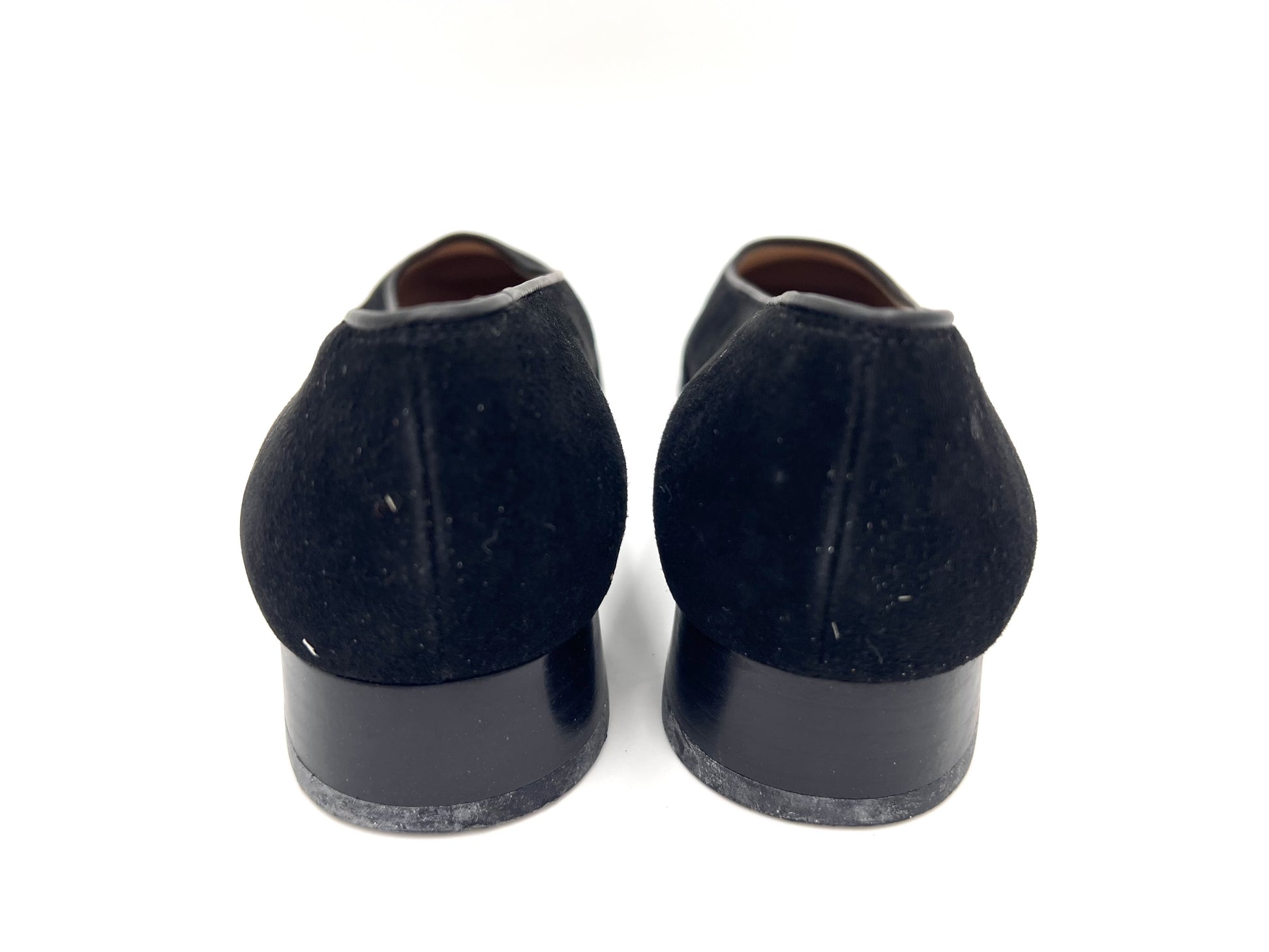 Salvatore Ferragamo Gancini embossed suede pumps in black, size 5