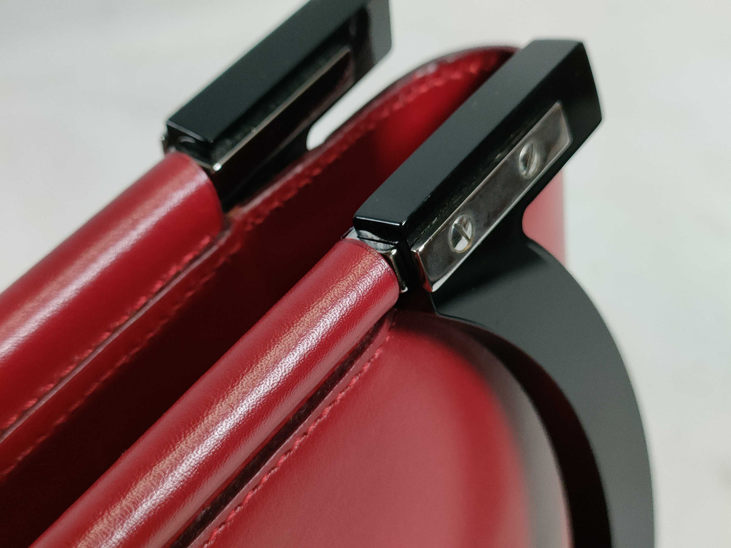 Salvatore Ferragamo Gancini plastic handle handbag