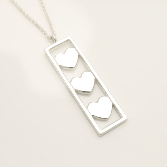 Tiffany & Co. Triple Heart Plate Necklace Pendant in Sterling Silver Weight: 2.58g