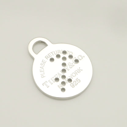 Tiffany & Co. Return to Tiffany Round Tag Arrow Punching Sagittarius Charm, 925 Sterling Silver, 8.20g