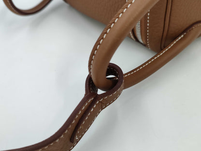 HERMES Lindy Mini Shoulder Bag in Taurillon Gold with Silver Hardware and K Stamp, with Protective Seal
