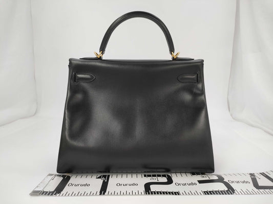 HERMES Kelly 32 Handbag, Black Box Calf Leather with E Stamp and Gold Hardware