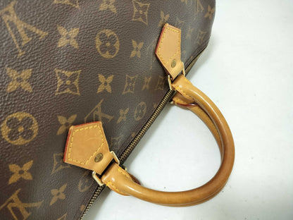 LOUIS VUITTON Monogram Louis Vuitton Speedy 30 Handbag