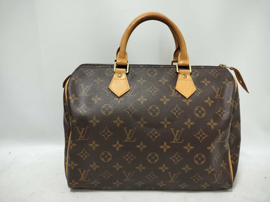 LOUIS VUITTON Monogram Louis Vuitton Speedy 30 Handbag