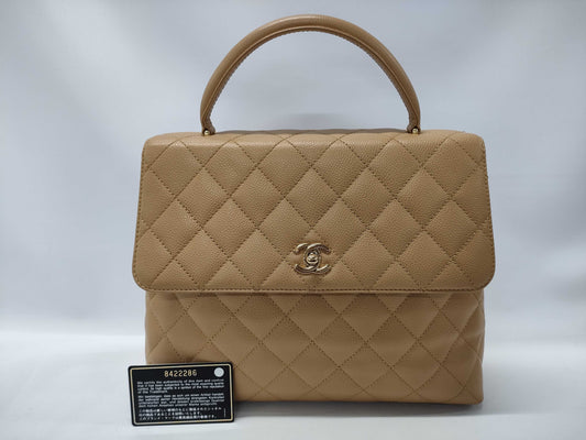 CHANEL Matelasse Coco Handle Handbag in Beige Caviar Leather 8422286