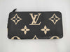 LOUIS VUITTON Empreinte Zippy Wallet in Black and Beige with IC Tag and G Hardware