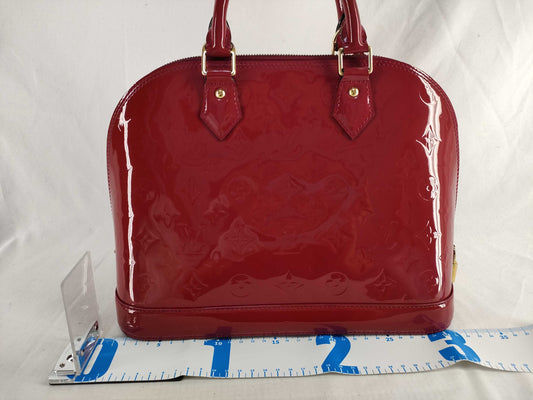 LOUIS VUITTON Louis Vuitton Enamel Alma BB Handbag