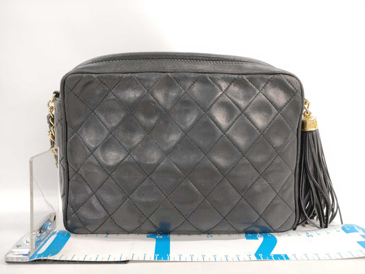 CHANEL Matelasse Lambskin Chain Shoulder Bag with Fringe, Black, and Gold Hardware, 1146182