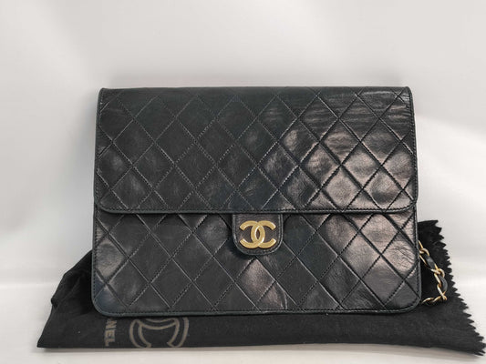 CHANEL Matelasse Chain Shoulder Bag in Black Lambskin. Includes dust bag.