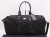 PRADA Nylon Triangle Logo Boston Bag in Black. Includes dust bag, name tag, crochet, padlock, and two keys.