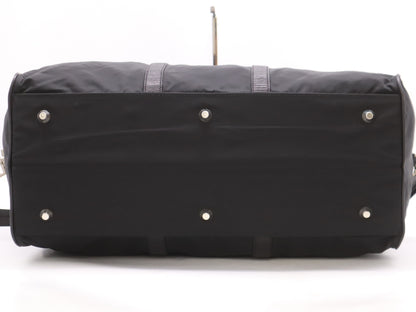 PRADA Nylon Triangle Logo Boston Bag in Black. Includes dust bag, name tag, crochet, padlock, and two keys.