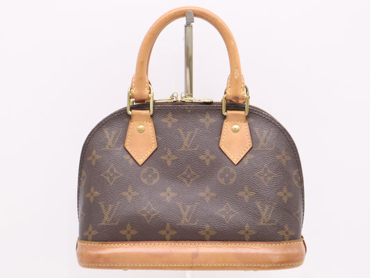 LOUIS VUITTON M53152 Monogram Alma BB Handbag with dust bag, box, padlock, two keys, and clochette