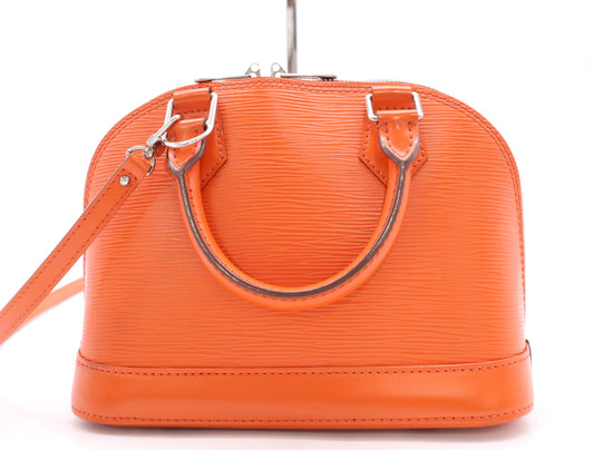 LOUIS VUITTON M57429 Epi Alma BB Orange Handbag with Shoulder Strap, Cloche, Cadena, and Two Keys