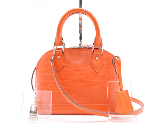 LOUIS VUITTON M57429 Epi Alma BB Orange Handbag with Shoulder Strap, Cloche, Cadena, and Two Keys