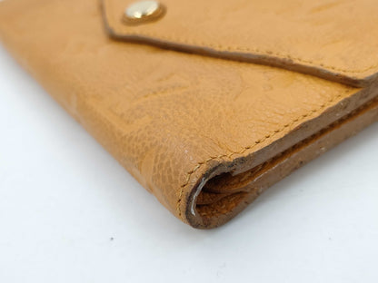 LOUIS VUITTON Vuitton Monogram Unplanted Wallet Yellow Wallet