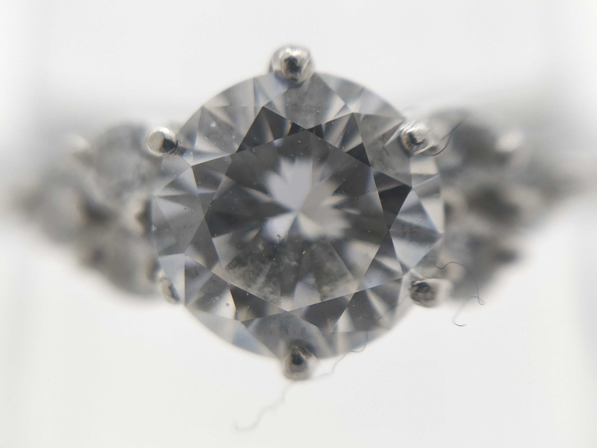 D0.557ct FD0.15ct PT1000 4.1g Ring 