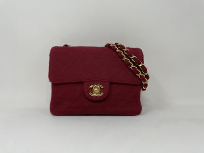 CHANEL CHANEL Mini Matelasse Shoulder Bag with Turn Lock, Gold Hardware, and Coco Mark