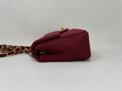CHANEL CHANEL Mini Matelasse Shoulder Bag with Turn Lock, Gold Hardware, and Coco Mark
