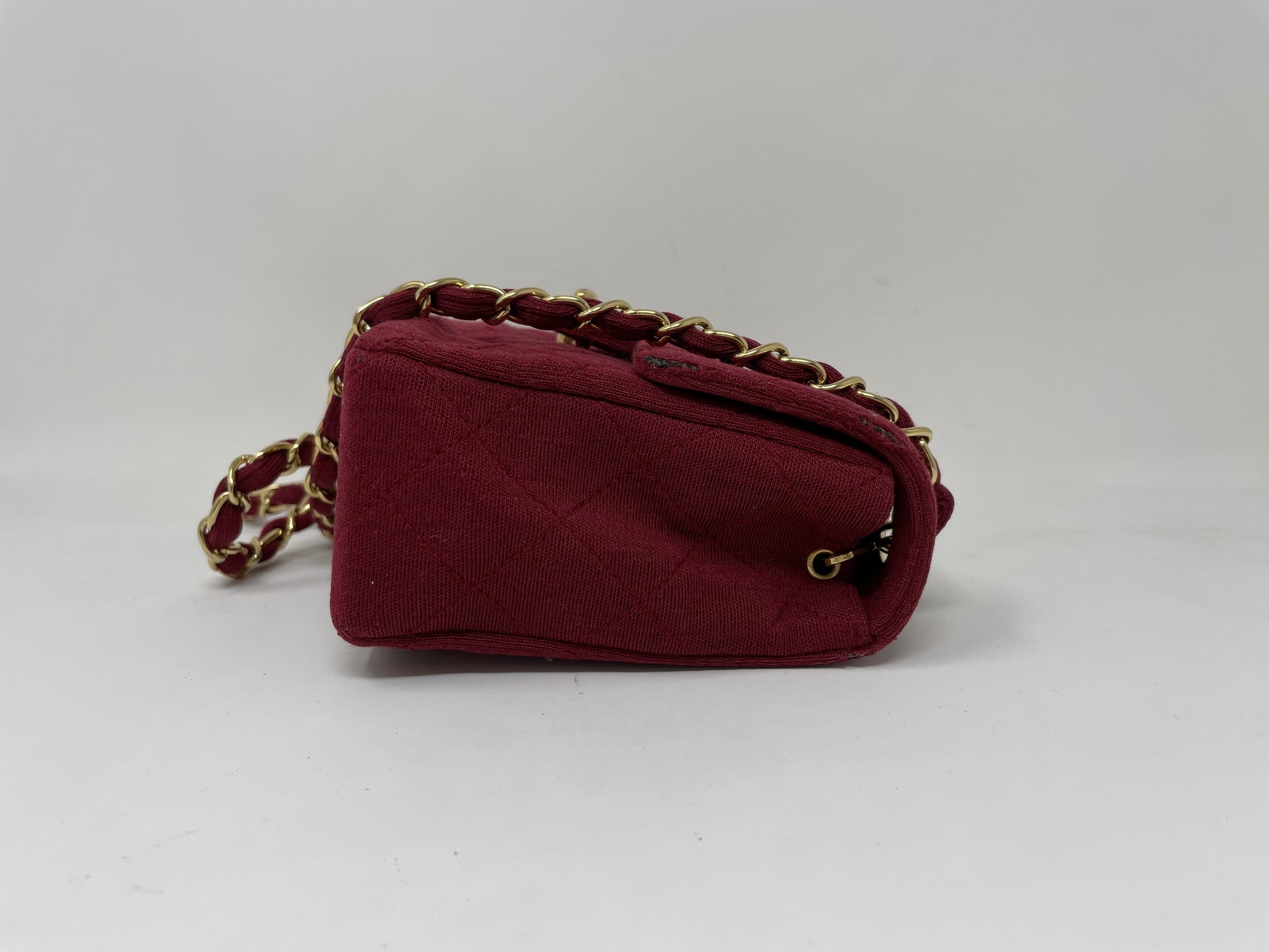 CHANEL CHANEL Mini Matelasse Shoulder Bag with Turn Lock, Gold Hardware, and Coco Mark