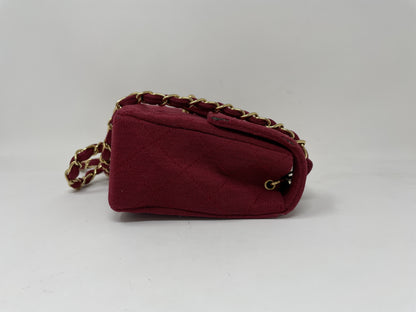 CHANEL CHANEL Mini Matelasse Shoulder Bag with Turn Lock, Gold Hardware, and Coco Mark
