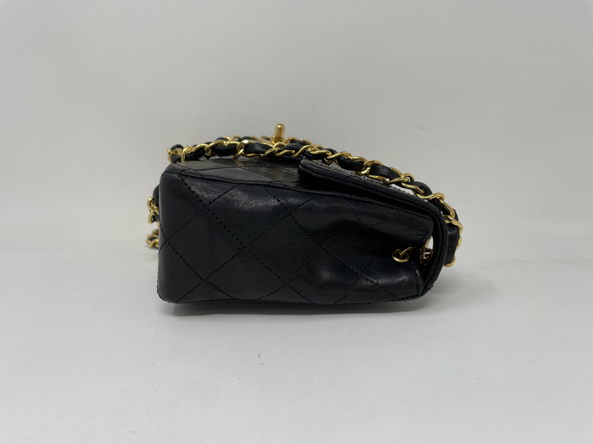 CHANEL CHANEL Mini Matelasse Shoulder Bag with Gold Hardware, Coco Mark, and Turn Lock