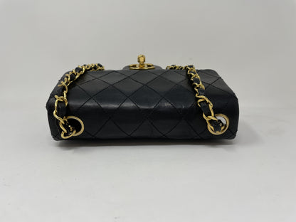 CHANEL CHANEL Mini Matelasse Shoulder Bag with Gold Hardware, Coco Mark, and Turn Lock