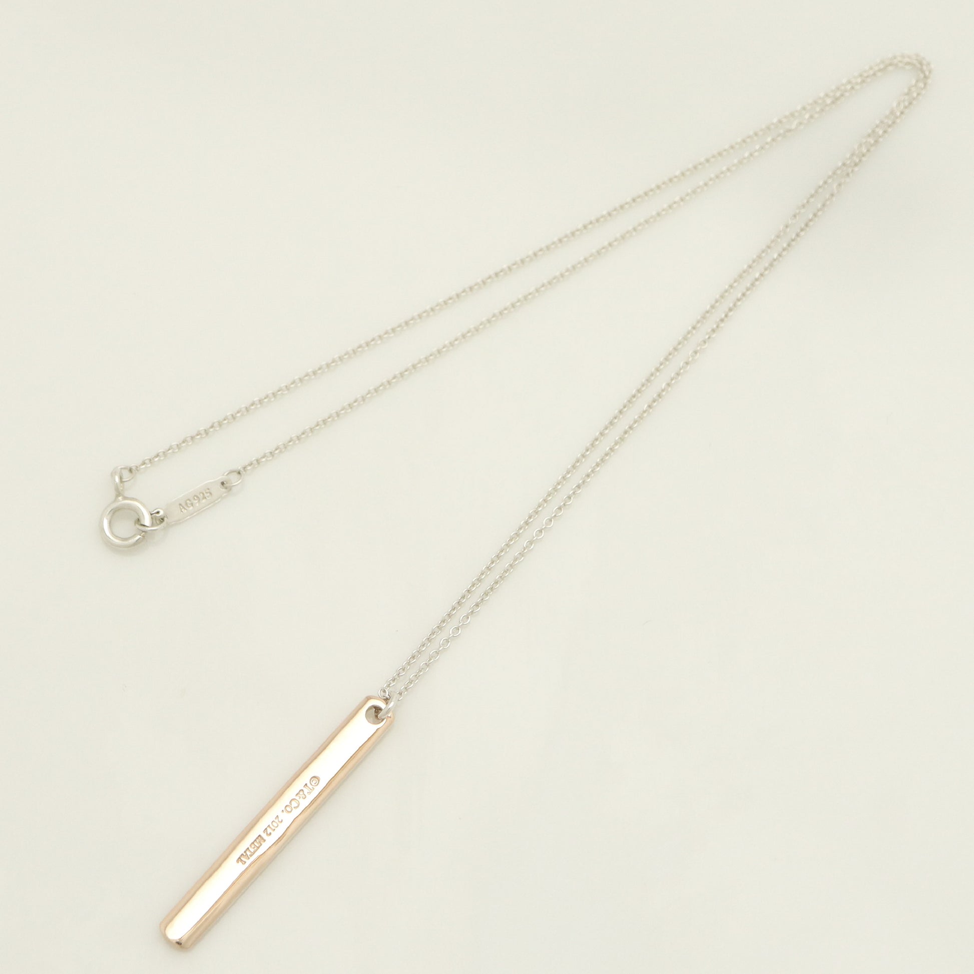 Tiffany & Co. 1837 Narrow Bar Rubedo Metal Necklace Pendant in Sterling Silver , Weight: 2.50g
