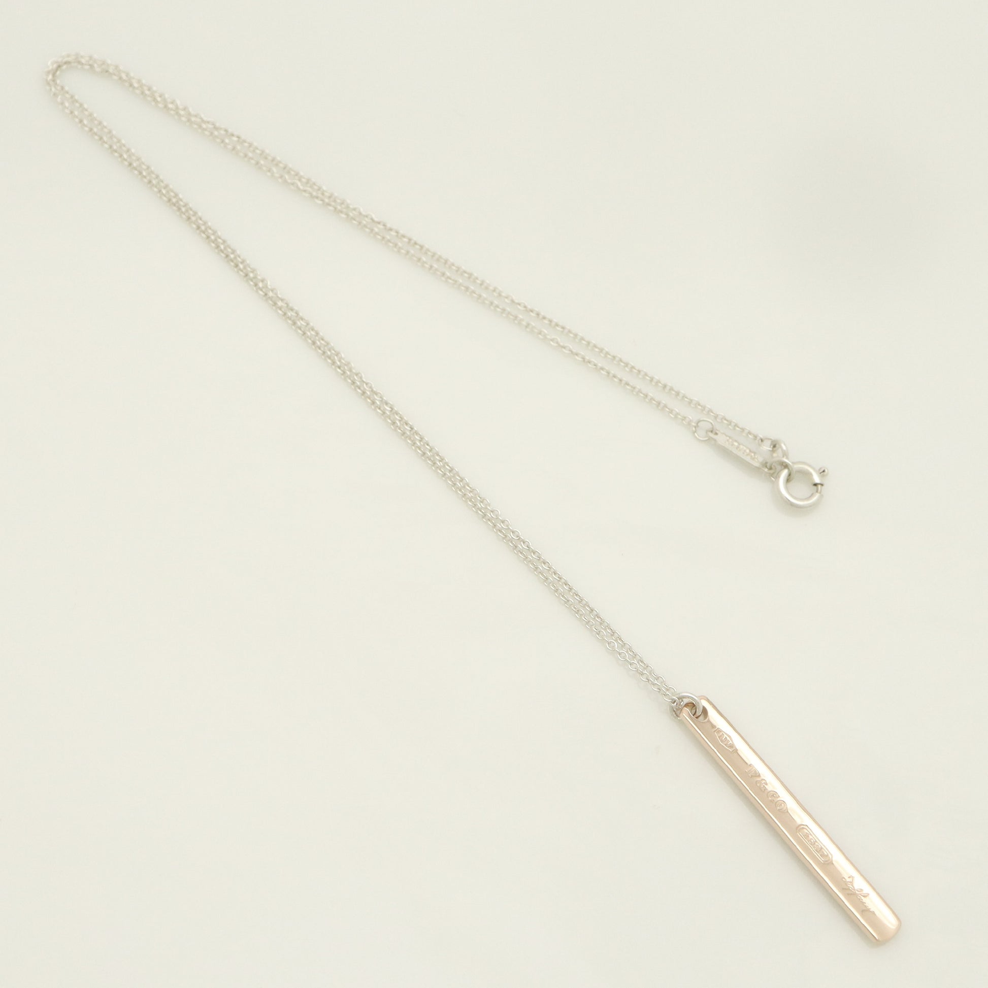 Tiffany & Co. 1837 Narrow Bar Rubedo Metal Necklace Pendant in Sterling Silver , Weight: 2.50g