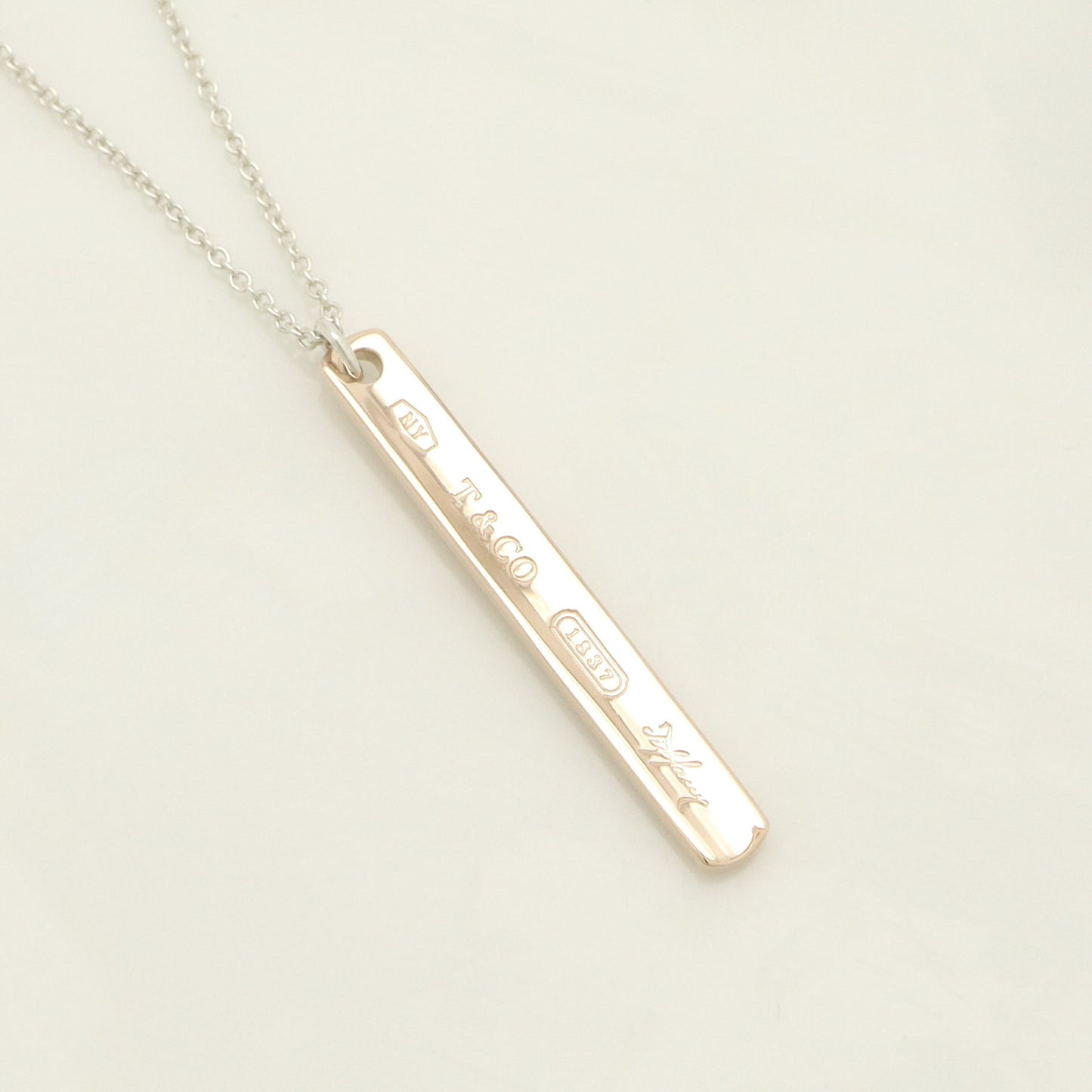 Tiffany & Co. 1837 Narrow Bar Rubedo Metal Necklace Pendant in Sterling Silver , Weight: 2.50g