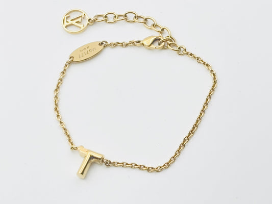 LOUIS VUITTON Vuitton M67177 LV&ME T Gold LE0175 Bracelet Bangle