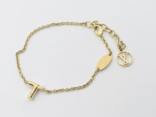 LOUIS VUITTON Vuitton M67177 LV&ME T Gold LE0175 Bracelet Bangle