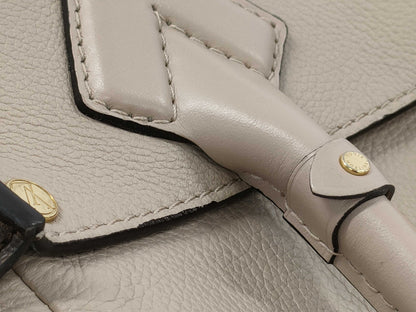 LOUIS VUITTON Louis Vuitton On My Side MM Handbag