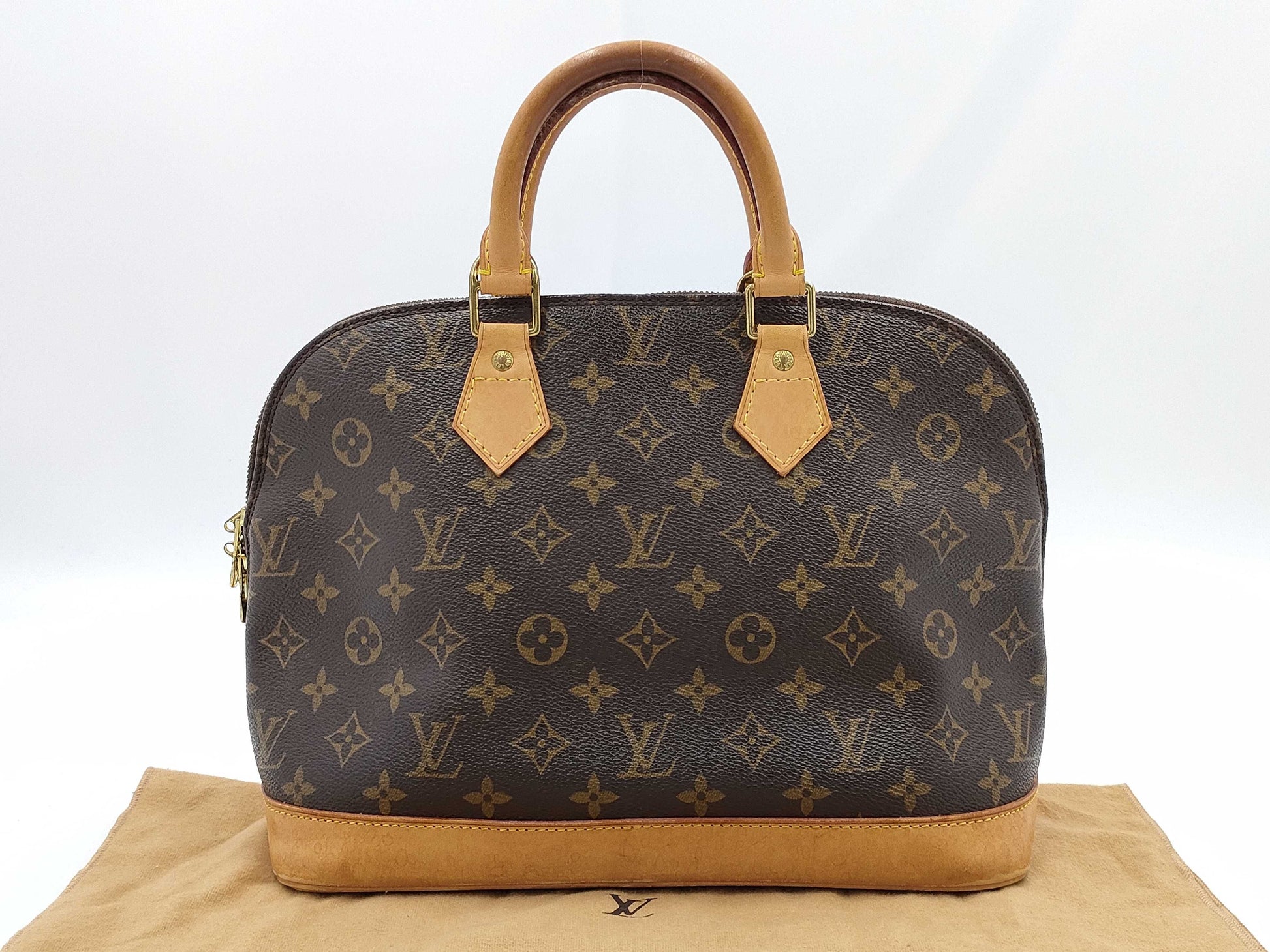 LOUIS VUITTON Monogram ALMA Handbag
