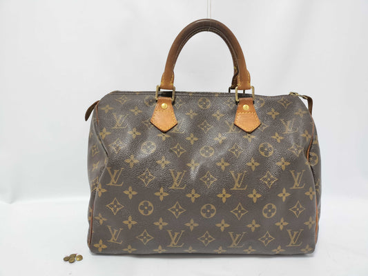 LOUIS VUITTON Monogram Louis Vuitton Speedy 30 Handbag