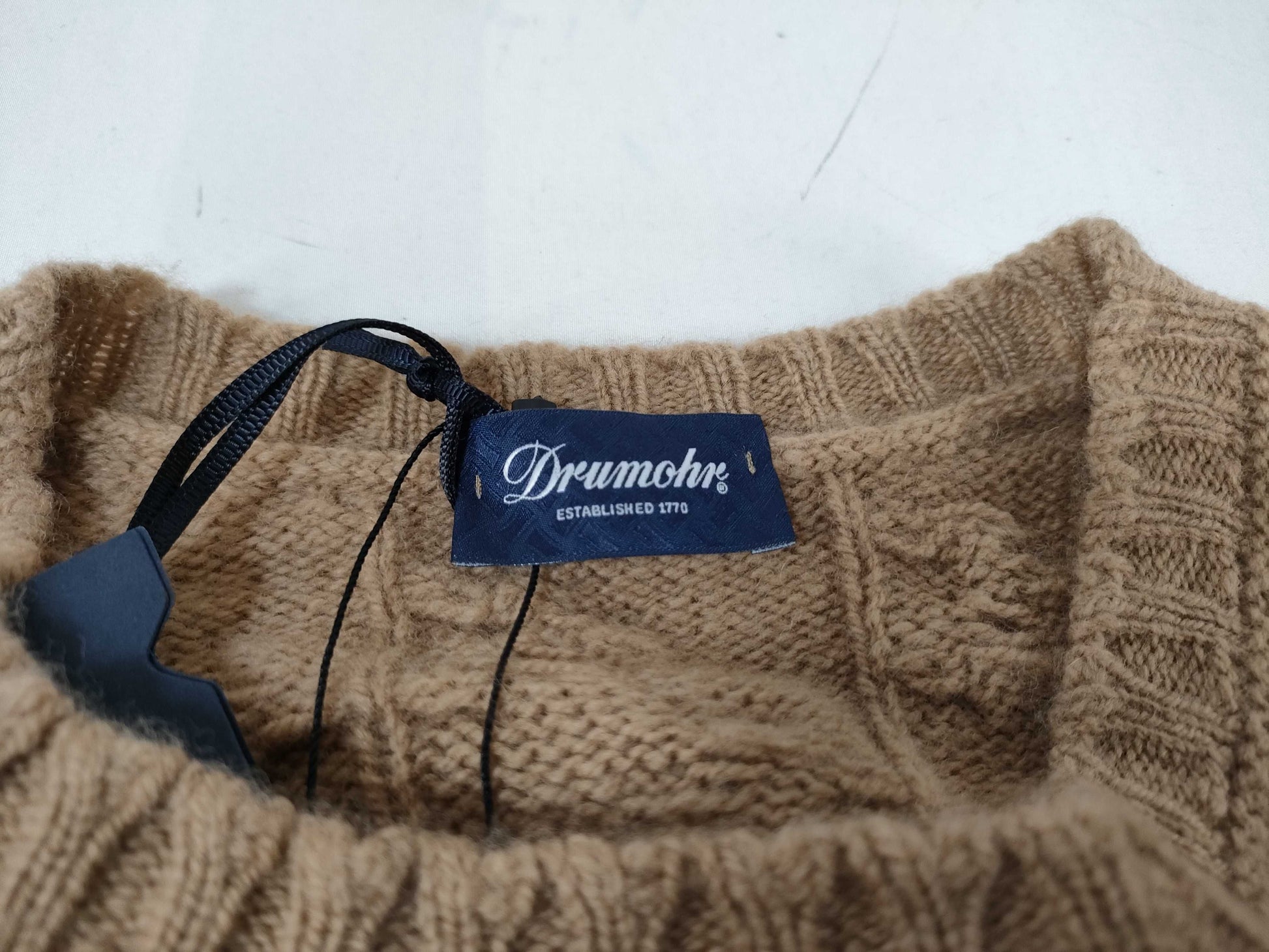 Dolmore knit top with tag
