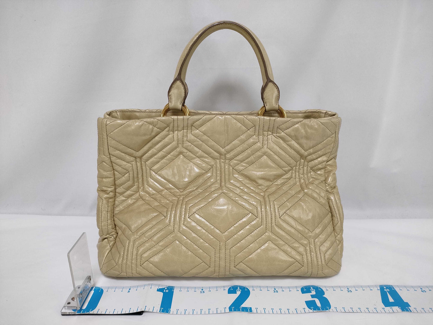 Miu Miu Miu 2-way handbag/shoulder bag in beige quilted leather.
