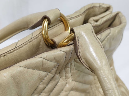 Miu Miu Miu 2-way handbag/shoulder bag in beige quilted leather.