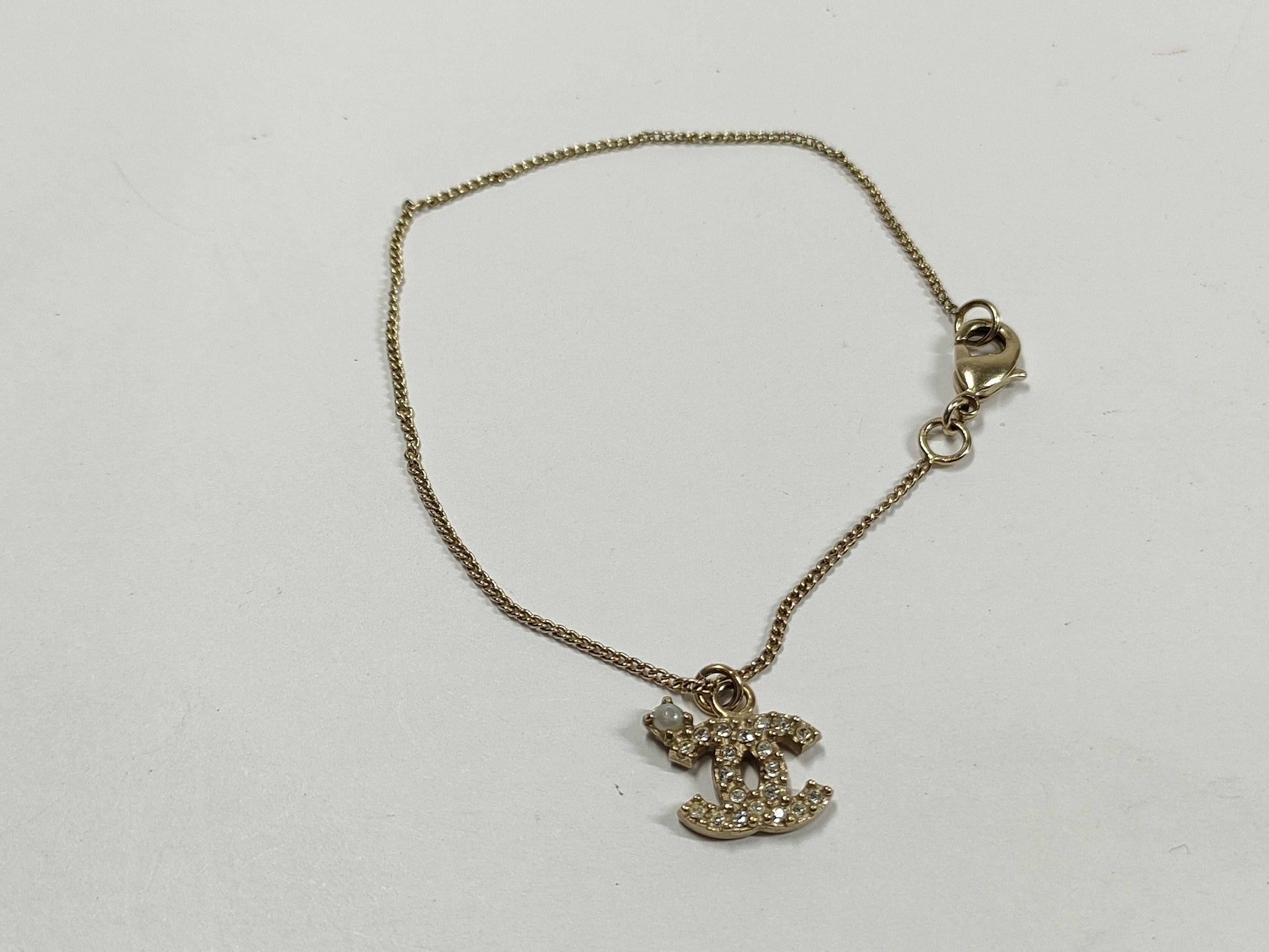 CHANEL Coco Mark Anklet with Rhinestones and Faux Pearls, Gold Bracelet/Bangle