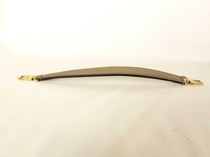 LOUIS VUITTON Handle Strap in Taupe Grained Leather with Gold Hardware