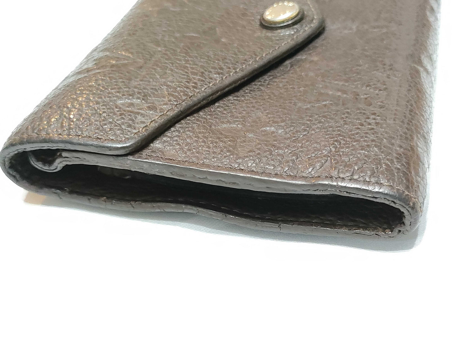 LOUIS VUITTON Monogram Empreinte Curie's Compact Brown Folding Wallet M60543