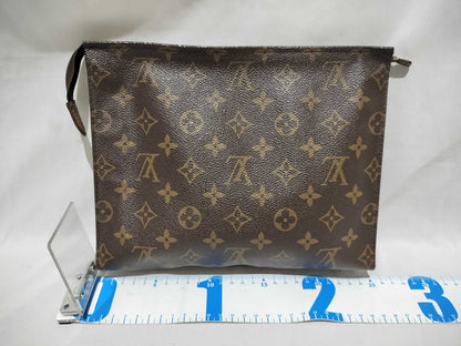 LOUIS VUITTON Monogram Poche Toilette 25 Pouch